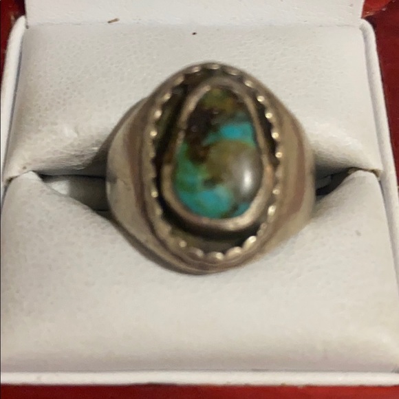 Sterling silver Navajo means turguoise stone ring
